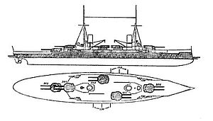 A large warship with five gun turrets, two tall masts, two funnels, and heavy armor protection.