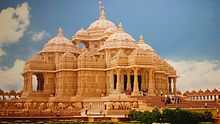 A complete view of Akshardham temple with people entering the temple