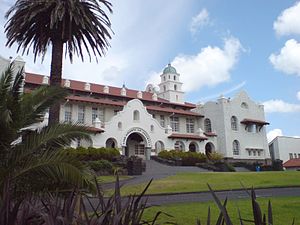 The school is built in 'Spanish Mission' style architecture.