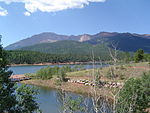 A lake and mountains in Pike National Forest.