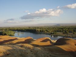 Black Irtysh river in Burqin County — «Colourful Beach» is famous spot for sightseeing