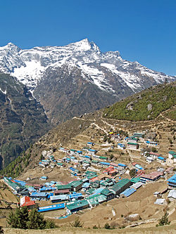 Namche Bazaar with Kongde Ri peak in the background.