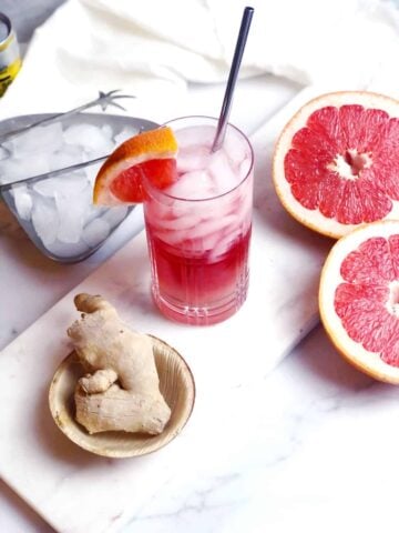 An easy mocktail recipe made with grapefruit and ginger, served over ice.