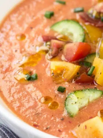 Gazpacho soup in a white bowl.