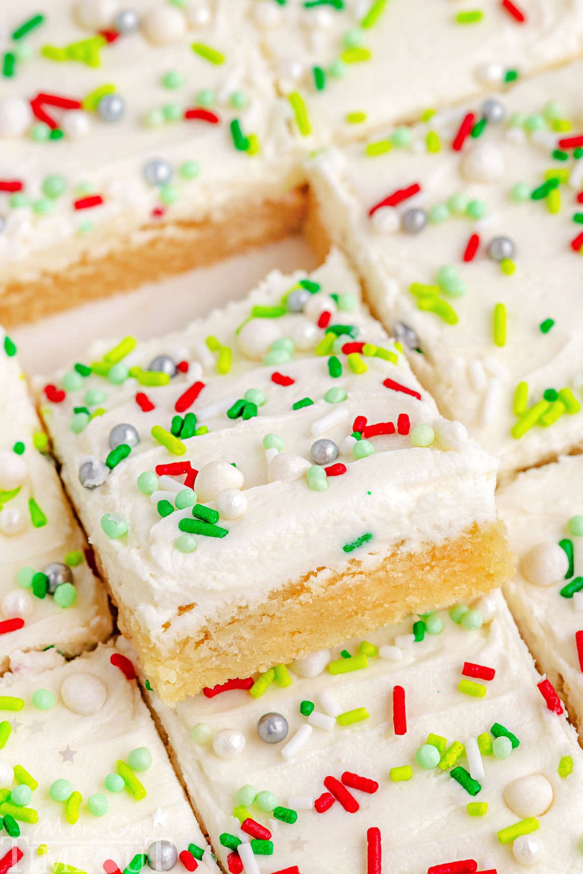 A Christmas Sugar Cookie Bar cut out of the rest of the bars.