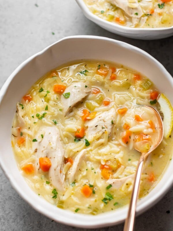 close-up of a bowl of Greek lemon chicken orzo soup