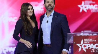 Don Trump, Jr. and Kimberly Guilfoyle stand on stage as they address the Conservative Political Action Conference being held in the Hyatt Regency on February 26, 2021 in Orlando, Florida.