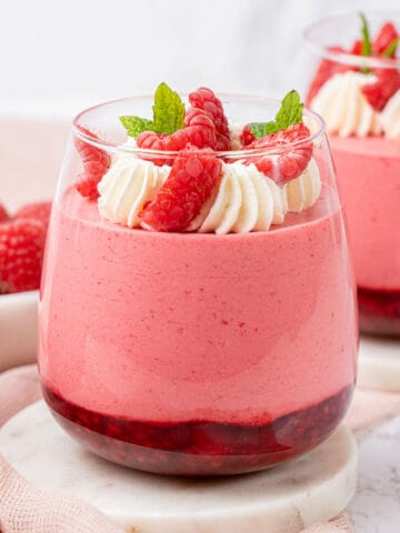 Raspberry mousse in a glass.