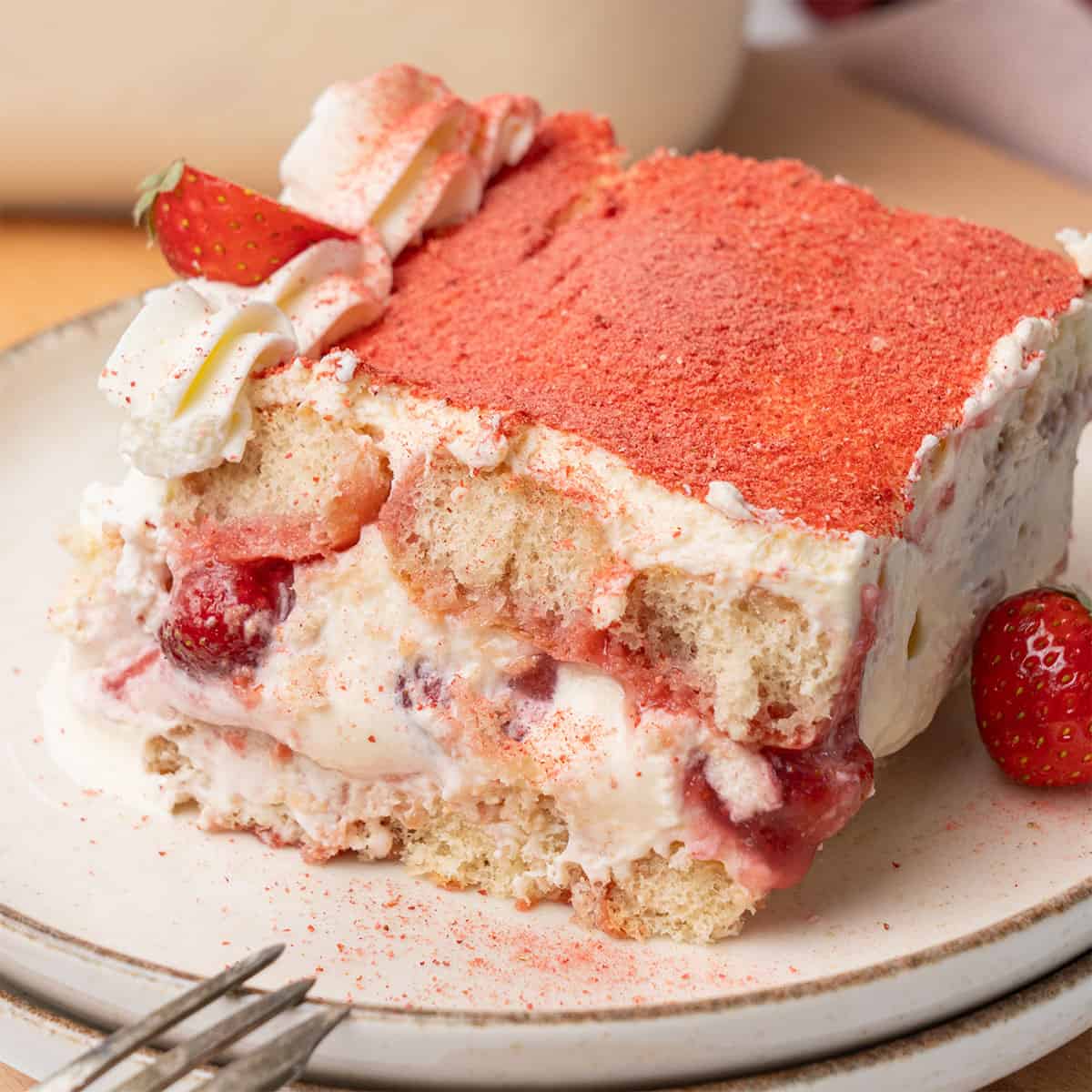 Strawberry tiramisu on a plate.