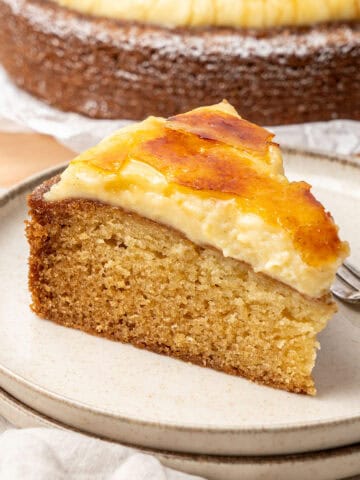 a slice of creme brulee cake on a plate.