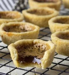 mini tarts on a cooling rack.