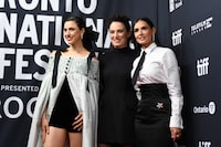 (L-R) Actress Margaret Qualley, director Coralie Fargeat and actress Demi Moore attend the North American premiere of "The Substance" on opening night of the Toronto International Film Festival at the Royal Alexandra Theatre in Toronto, Ontario, Canada, on September 5, 2024. (Photo by VALERIE MACON / AFP) (Photo by VALERIE MACON/AFP via Getty Images)