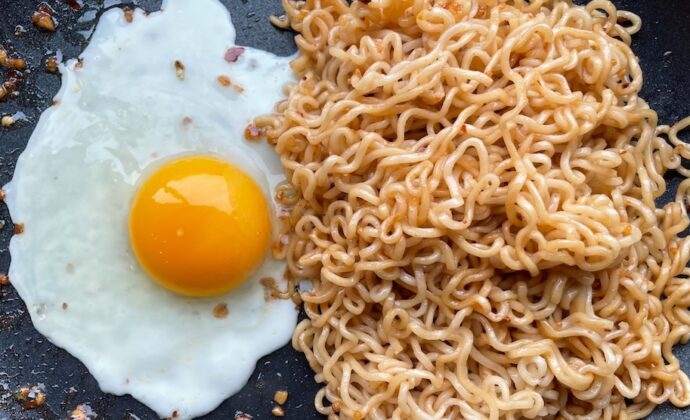 Yummy ramen noodle stir fry dinner made with eggs.