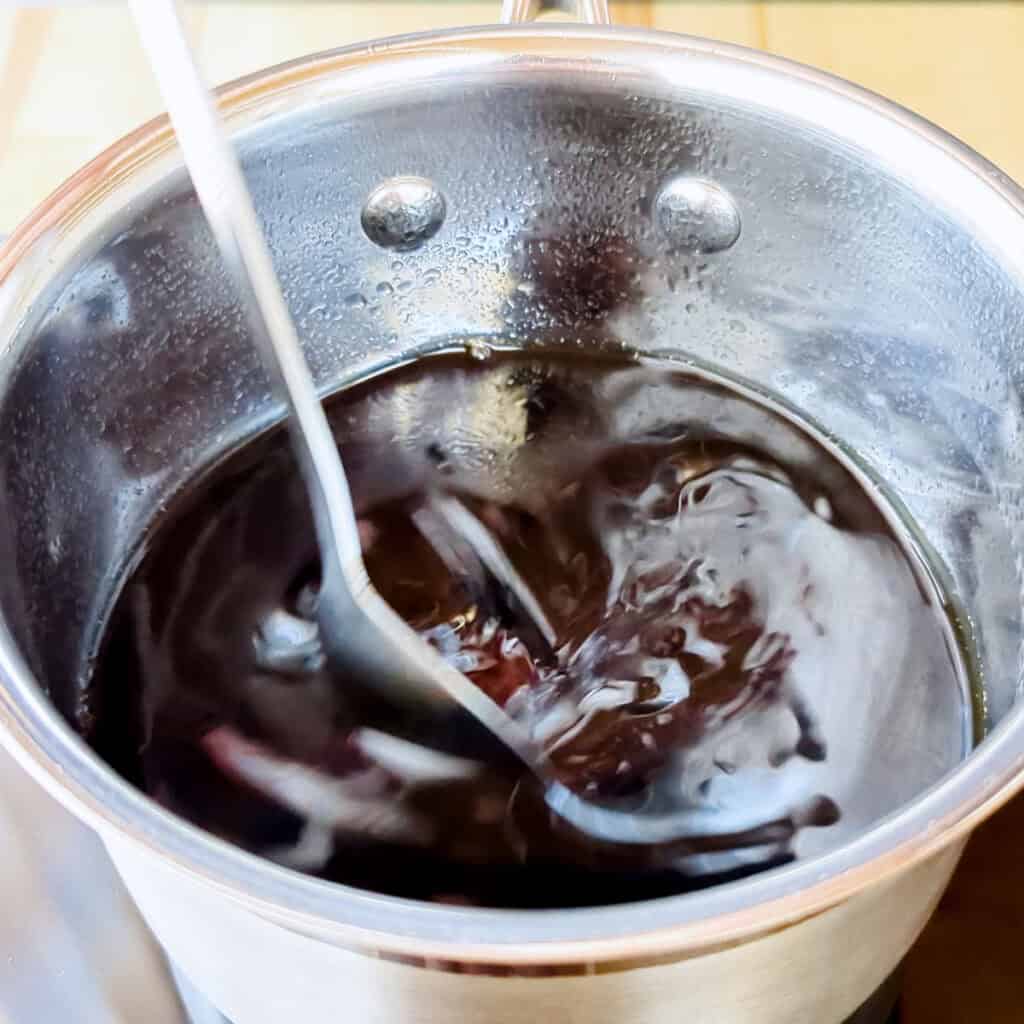 Stirring the warishita sauce for the sukiyaki.