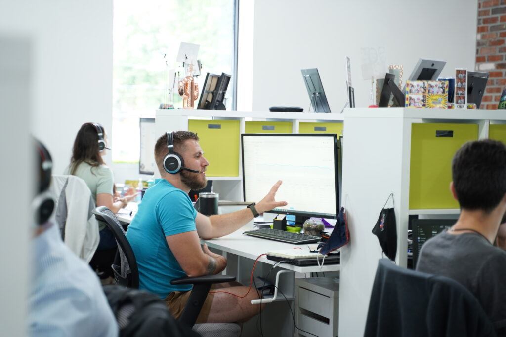 WebFX employee talking on computer